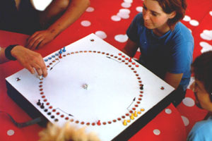 image of people playing transacoustic board game